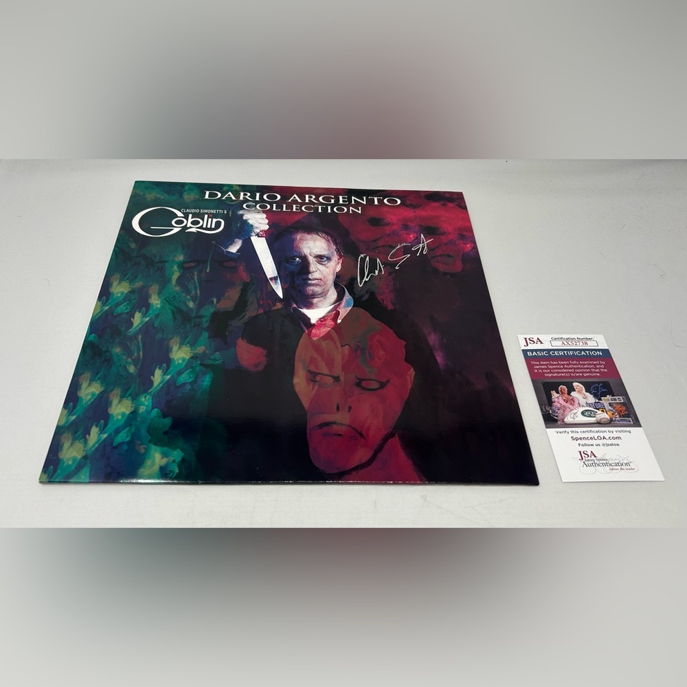 Claudio‎ Simonetti signed Goblin Dario Argentina Collection Album JSA COA